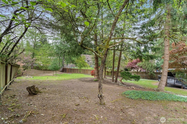 107 219th Pl SE, Bothell, WA 98021 - fenced backyard with a wooden deck