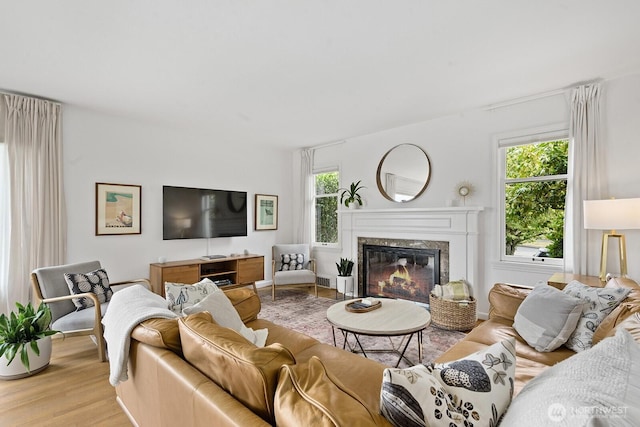 1604 28th Ave W, Seattle, WA 98199 - living area with wood finished floors and a fireplace