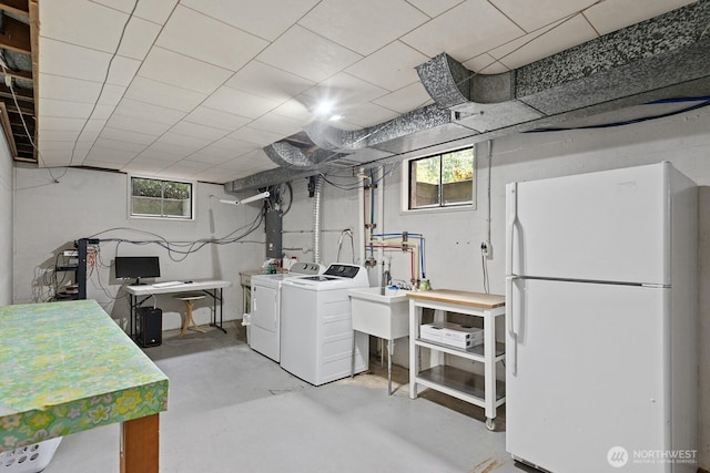 1604 28th Ave W, Seattle, WA 98199 - below grade area featuring freestanding refrigerator, washing machine and dryer, and an office area