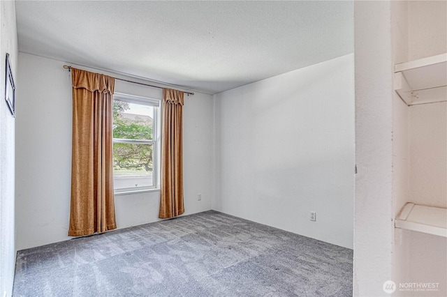 530 Sunday Dr, East Wenatchee, WA 98802 - unfurnished room featuring carpet and a textured ceiling