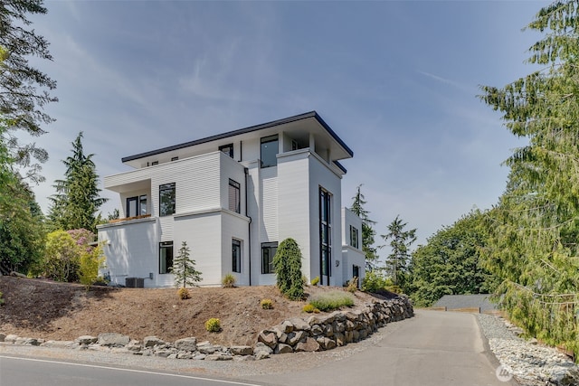 2115 Squak Mountain Loop SW, Issaquah, WA 98027 - view of side of property with a central air condition unit