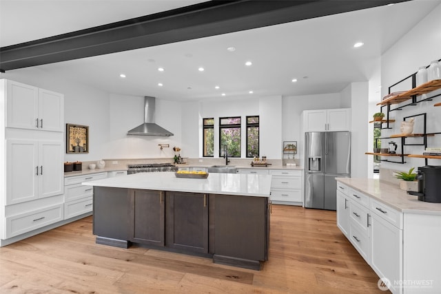 2115 Squak Mountain Loop SW, Issaquah, WA 98027 - kitchen with wall chimney exhaust hood, stainless steel fridge with ice dispenser, open shelves, recessed lighting, and white cabinets