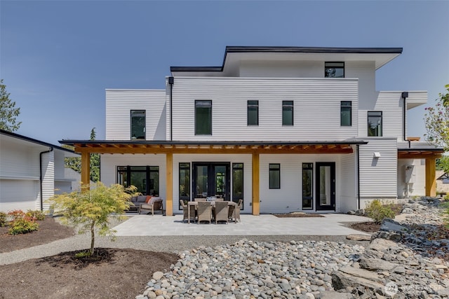 2115 Squak Mountain Loop SW, Issaquah, WA 98027 - rear view of property with a patio area and outdoor lounge area