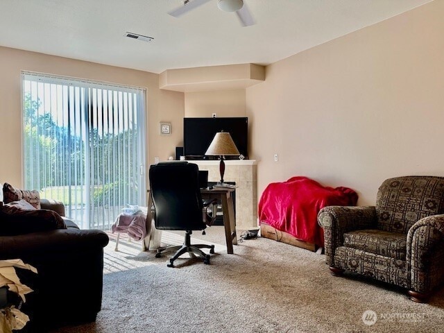 1548 River Rd Unit 105, Longview, WA 98632 - carpeted home office featuring ceiling fan