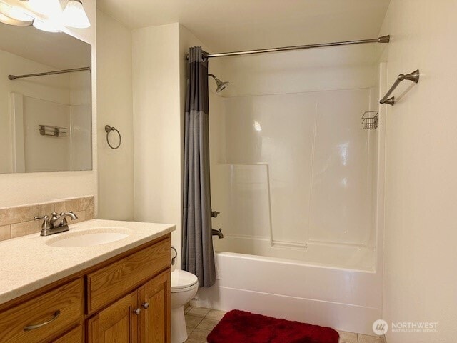 1548 River Rd Unit 105, Longview, WA 98632 - full bath with shower / bathtub combination with curtain, vanity, and tile patterned flooring
