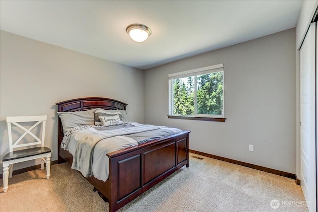 13131 287th Ave SE, Monroe, WA 98272 - bedroom featuring light colored carpet and a closet
