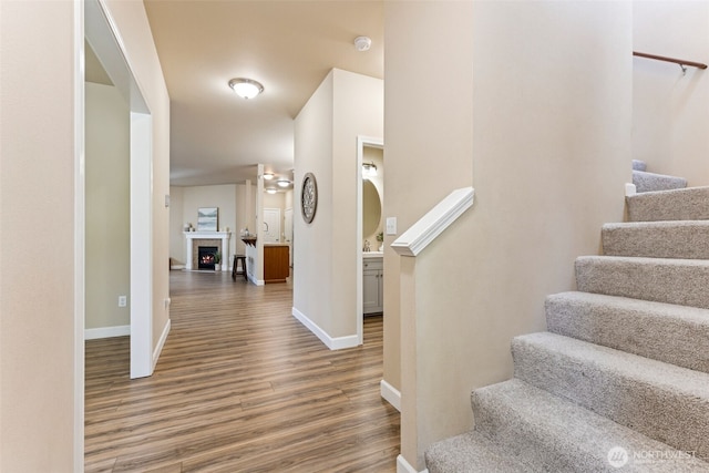 4444 Edgewater Blvd NE, Lacey, WA 98516 - stairs with wood finished floors and baseboards