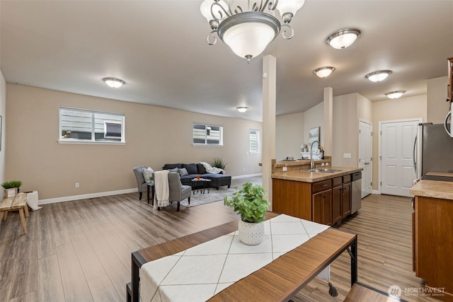 4444 Edgewater Blvd NE, Lacey, WA 98516 - dining room with baseboards and wood finished floors