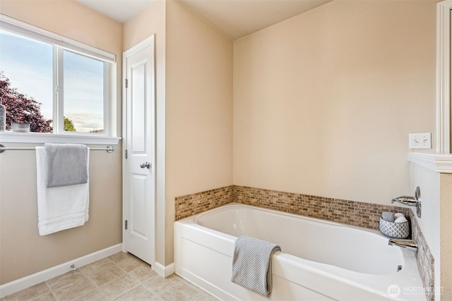 4444 Edgewater Blvd NE, Lacey, WA 98516 - bathroom with a garden tub and baseboards