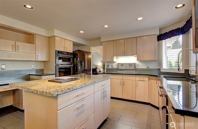 15108 NE 22nd Ave, Salmon Creek, WA 98686 - kitchen with light brown cabinets, stainless steel double oven, high end fridge, recessed lighting, and light stone counters
