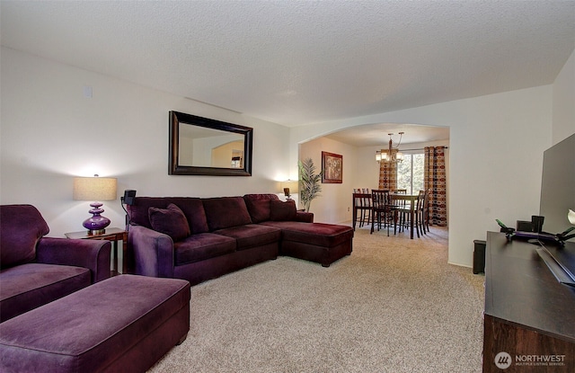 15108 NE 22nd Ave, Salmon Creek, WA 98686 - carpeted living room with a chandelier and arched walkways