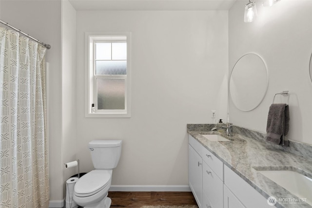 1828 Kristina Ln, Wenatchee, WA 98801 - bathroom with double vanity, wood finished floors, and a shower with curtain