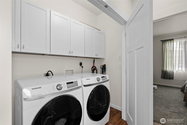 1828 Kristina Ln, Wenatchee, WA 98801 - washroom featuring cabinet space, separate washer and dryer, and dark wood-style flooring