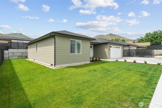 1828 Kristina Ln, Wenatchee, WA 98801 - view of front of home with driveway, an attached garage, and a mountain view