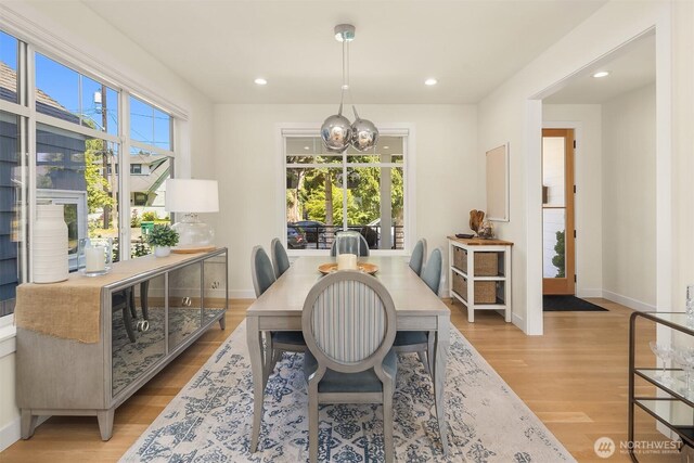2809 NW 71st St, Seattle, WA 98117 - dining space with a chandelier, light wood finished floors, and recessed lighting