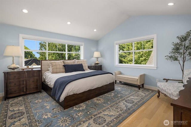 2809 NW 71st St, Seattle, WA 98117 - bedroom with wood finished floors, vaulted ceiling, and recessed lighting