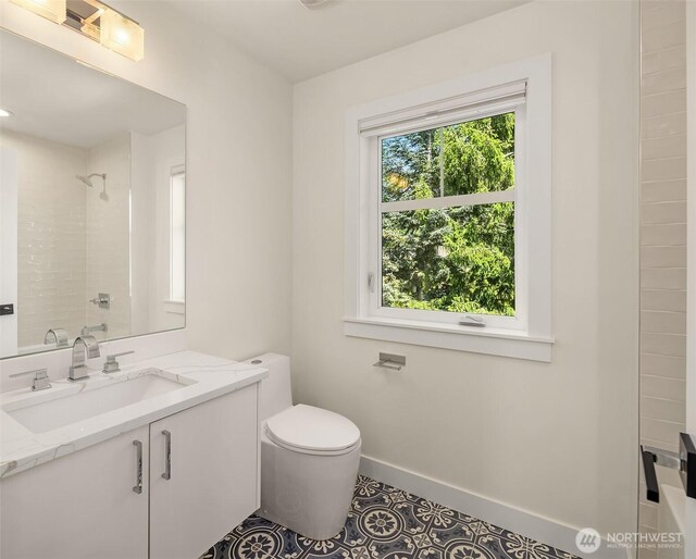 2809 NW 71st St, Seattle, WA 98117 - bathroom with vanity, a shower, and tile patterned floors