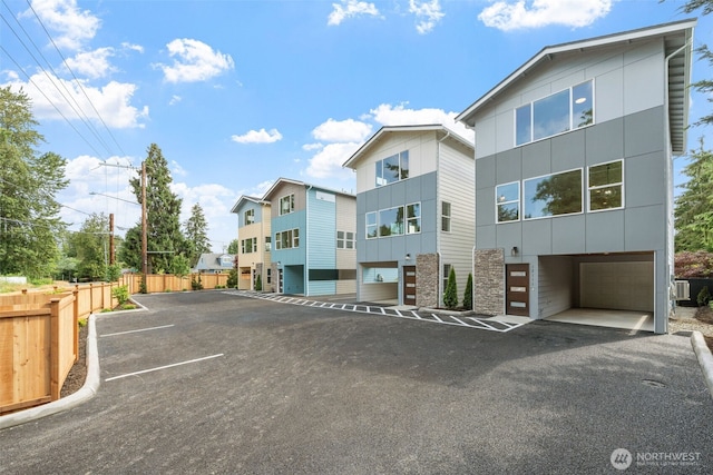 12107 E Gibson, Everett, WA 98204 - view of property featuring a garage and uncovered parking