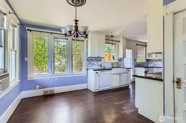 26405 Stephens St, Duvall, WA 98019 - kitchen featuring dishwasher, dark countertops, a chandelier, and plenty of natural light