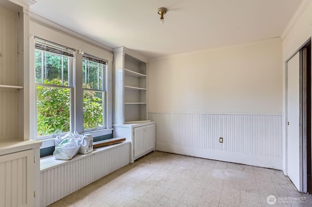 26405 Stephens St, Duvall, WA 98019 - unfurnished bedroom featuring light flooring, wainscoting, and ornamental molding