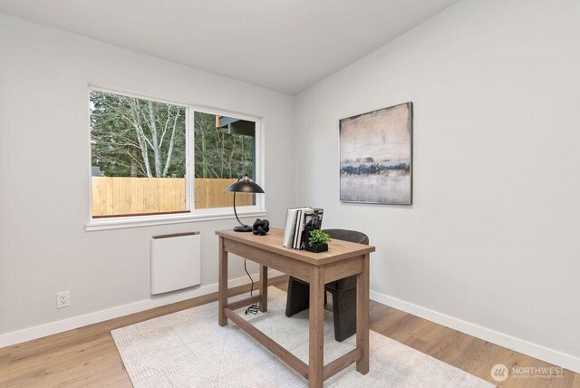 4968 Morgan Dr, Blaine, WA 98230 - home office with radiator and wood finished floors