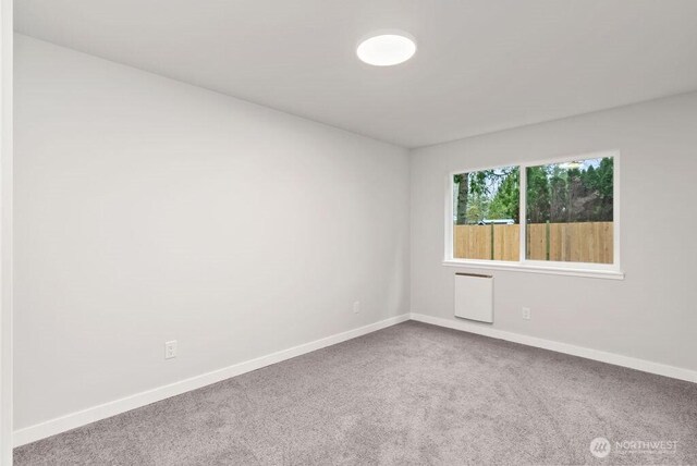 4968 Morgan Dr, Blaine, WA 98230 - spare room featuring carpet flooring and baseboards