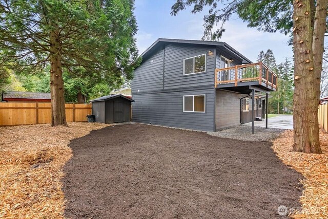 4968 Morgan Dr, Blaine, WA 98230 - back of property with a shed, a patio area, and a deck