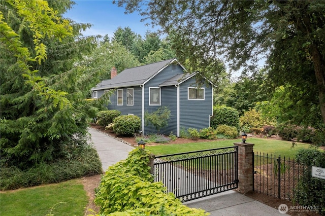 23305 98th Ave S, Kent, WA 98031 - view of front of house with a gate and a chimney