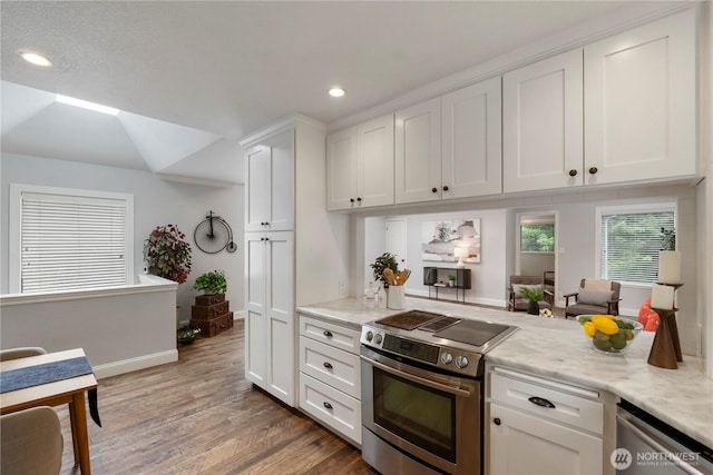 23305 98th Ave S, Kent, WA 98031 - kitchen featuring appliances with stainless steel finishes, light wood-style flooring, recessed lighting, white cabinetry, and light stone countertops