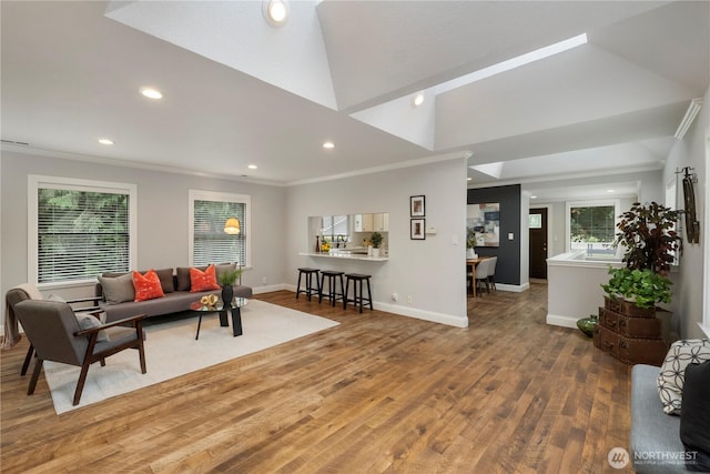 23305 98th Ave S, Kent, WA 98031 - living room with recessed lighting, wood finished floors, ornamental molding, and lofted ceiling