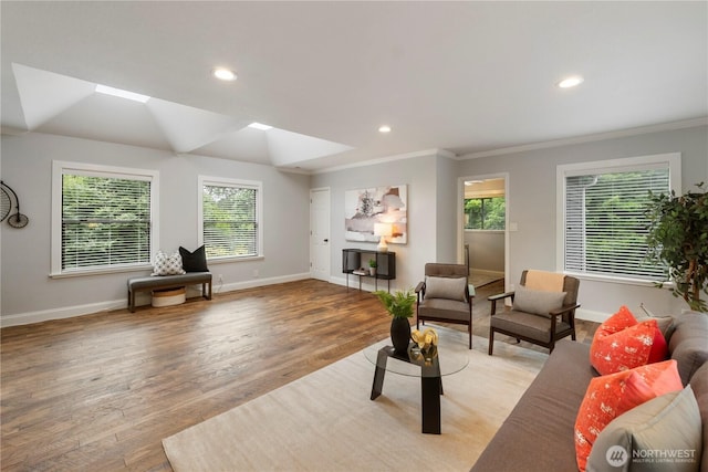 23305 98th Ave S, Kent, WA 98031 - living area featuring wood finished floors, crown molding, a skylight, and recessed lighting