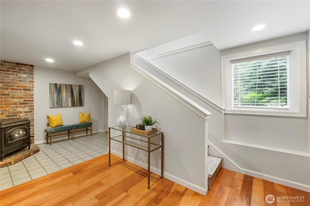 23305 98th Ave S, Kent, WA 98031 - stairway featuring a wood stove, wood finished floors, and recessed lighting
