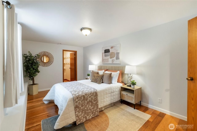 23305 98th Ave S, Kent, WA 98031 - bedroom with light wood-style flooring and baseboards