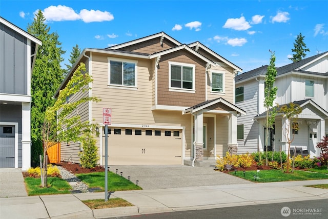 21124 42nd Dr SE, Bothell, WA 98021 - view of front of house with driveway and a garage