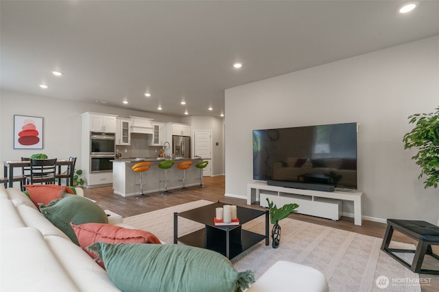 21124 42nd Dr SE, Bothell, WA 98021 - living area with wood finished floors and recessed lighting