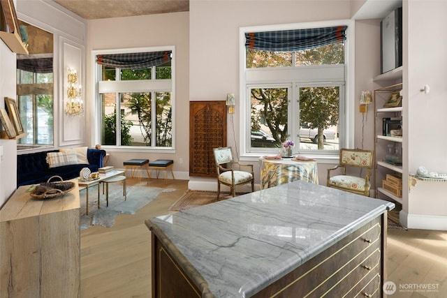 159 Denny Way Unit 112, Seattle, WA 98109 - interior space featuring light wood-style flooring and a center island