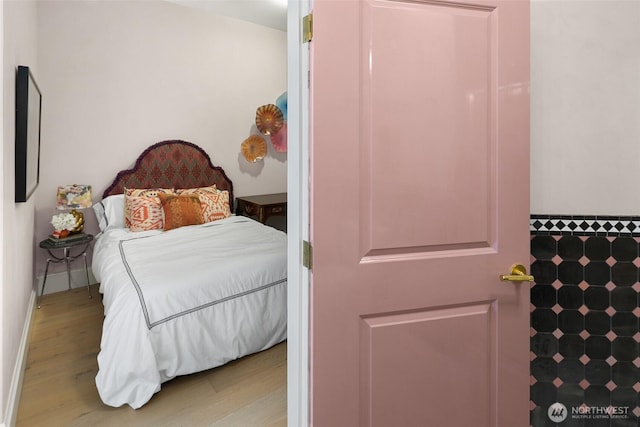 159 Denny Way Unit 112, Seattle, WA 98109 - bedroom with wood finished floors