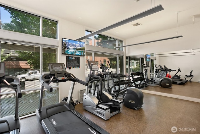 159 Denny Way Unit 112, Seattle, WA 98109 - workout area featuring healthy amount of natural light and a high ceiling