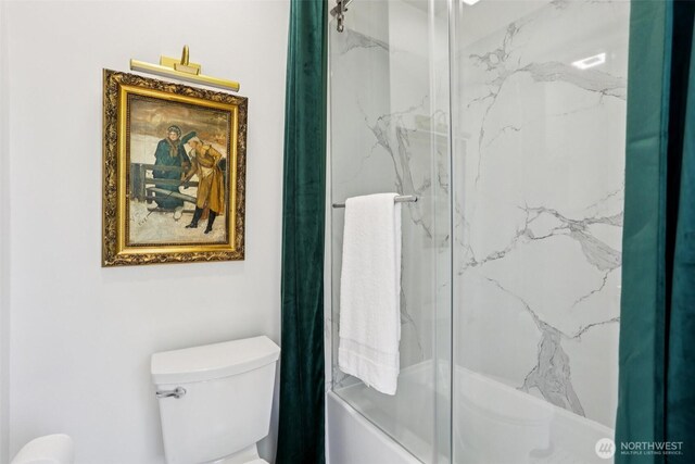 2233 2nd Ave W, Seattle, WA 98119 - bathroom featuring shower / bath combination with glass door and toilet
