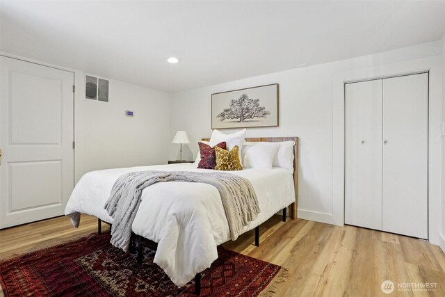 2233 2nd Ave W, Seattle, WA 98119 - bedroom with light wood-type flooring and recessed lighting