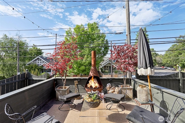 2233 2nd Ave W, Seattle, WA 98119 - view of patio / terrace with an outdoor fire pit