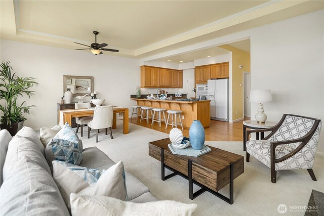 6290 Harbour Heights Parkway Unit A3, Mukilteo, WA 98275 - living area with a tray ceiling, a ceiling fan, and recessed lighting