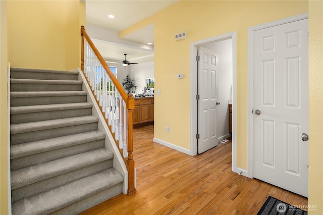 6290 Harbour Heights Parkway Unit A3, Mukilteo, WA 98275 - stairway with wood finished floors, a ceiling fan, and recessed lighting