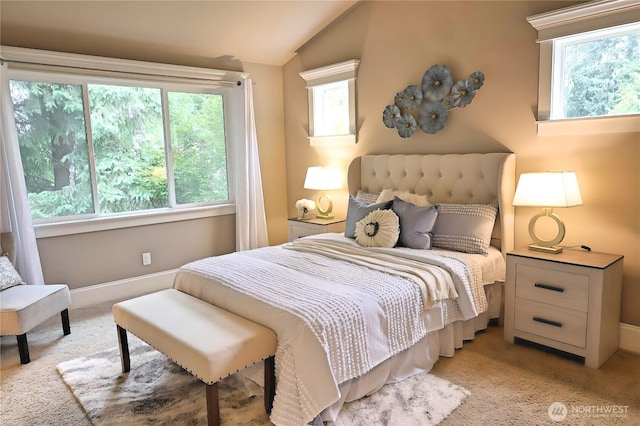 12265 168th Ct NE, Redmond, WA 98052 - bedroom with light colored carpet, multiple windows, and lofted ceiling