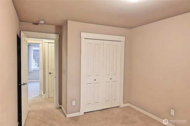 12265 168th Ct NE, Redmond, WA 98052 - unfurnished bedroom with light carpet and a closet