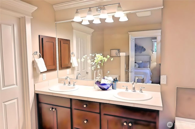 12265 168th Ct NE, Redmond, WA 98052 - bathroom featuring double vanity and ensuite bath