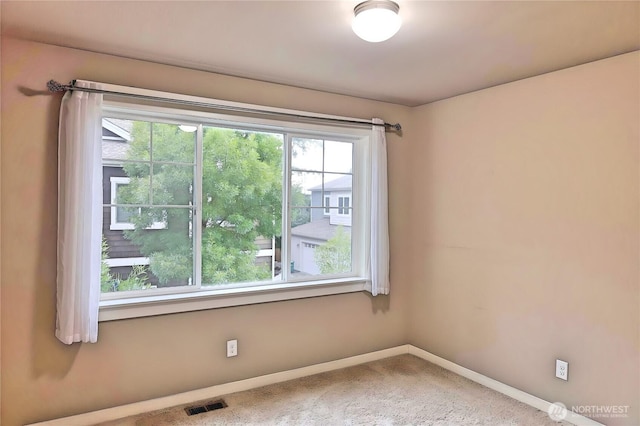 12265 168th Ct NE, Redmond, WA 98052 - empty room featuring baseboards and carpet