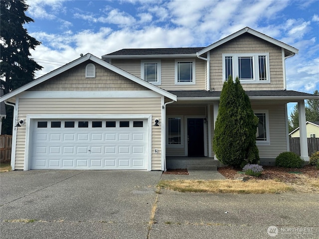 15328 104th Ave SE, Yelm, WA 98597 - view of front facade with driveway and a garage