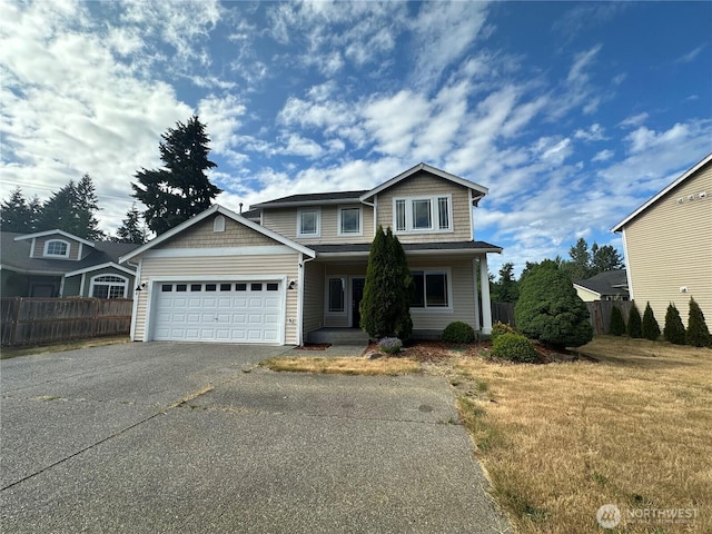 15328 104th Ave SE, Yelm, WA 98597 - view of front of house featuring asphalt driveway and a garage