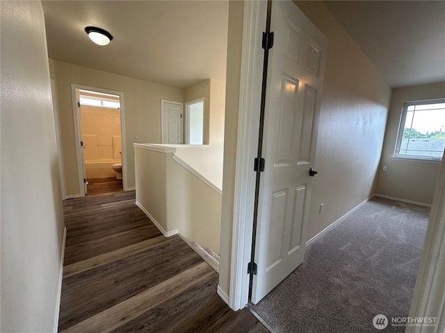 15328 104th Ave SE, Yelm, WA 98597 - corridor with baseboards and dark wood-type flooring